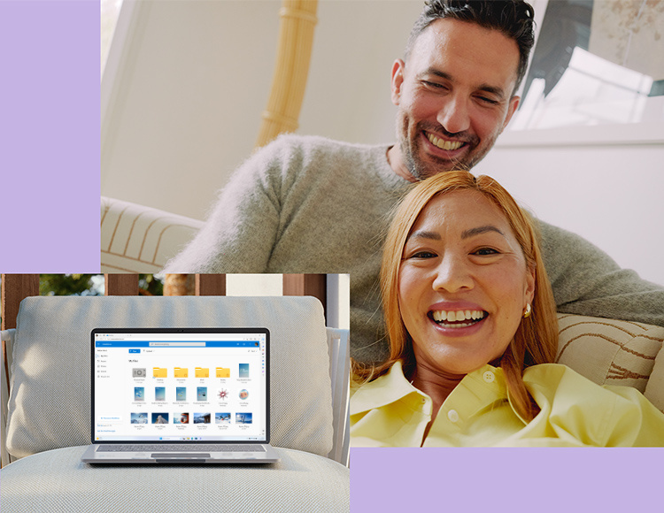 Ein Mann und eine Frau schauen auf den Microsoft-365-Bildschirm auf einem PCSpecialist-Laptop